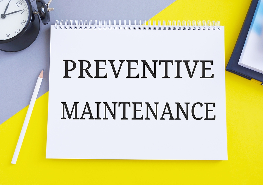 Preventive Maintenance Text Concept Written In Notebook